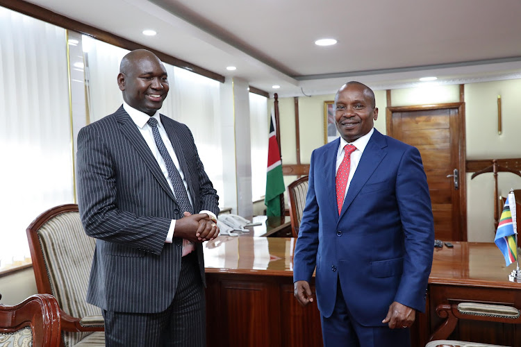 Interior CS Kithure Kindiki with Immigration and Citizen Services Principal Secretary Prof Julius Bitok on April 30, 2024.