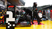 Pole position qualifier Lewis Hamilton of Great Britain and Mercedes GP celebrates in parc ferme during qualifying for the Formula One Grand Prix of Styria at Red Bull Ring on July 11, 2020 in Spielberg, Austria.