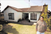 NOT FAIR: Daniel Mollo in front of the house that is no longer his. Pic. Elvis Ntombela. 20/07/2009. © Sowetan.
20090720  Dan Mollo from Katlaping section in Tembisa, Ekurhuleni Gauteng in front of his house, Mollo is in battle with a financial instutuition over his house and a loan.  PHOTO: ELVIS NTOMBELA