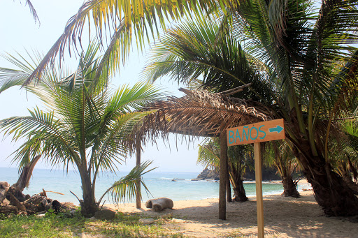 banos - Punta Sal: A beautiful stretch of sand with colorful pops offers local cuisine for lunchtime fuel.