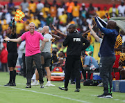 Kaizer Chiefs coach Ernst Middendorp with his Mamelodi Sundowns counterpart Pitso Mosimane during a match.  