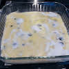 Thumbnail For Batter In A Baking Dish With Sugar Sprinkled On Top.