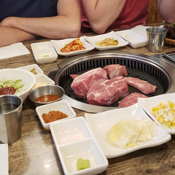 Various cuts of pork (unseasoned) cooked right in front of you with various sides and sauces (some GF, some not)