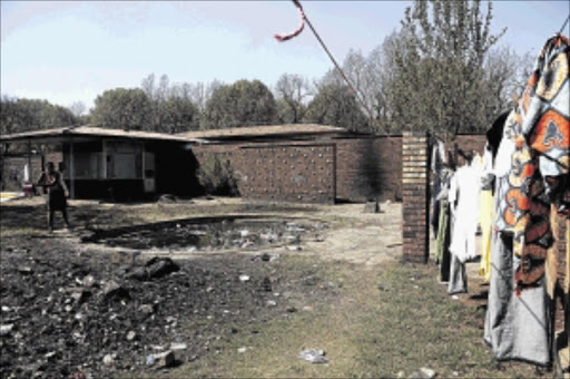 NEW USE: Homeless people started moving into Murray Park swimming pool in Johannesburg shortly after it was closed down in 2005. The city admits to poor maintenance of its public pools Photo: Thulani Mbele