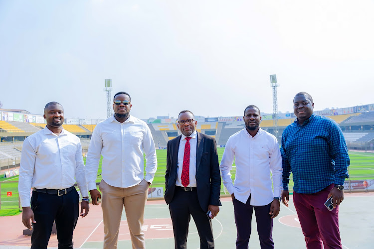 UNAA Vice President Charles Bukenya Muvalwa and Brian Kayongo toured the new Nakivubo national stadium in Kampala