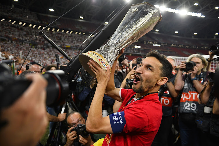 Jesus Navas of Sevilla FC celebrates with the cup after winning the 2023 Uefa Europa League final against AS Roma at Puskas Arena in Budapest, Hungary on May 31 2023.