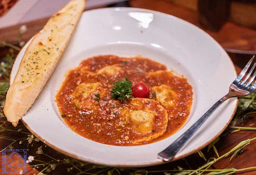 Spinach & Ricotta Ravioli In Pomodoro Sauce