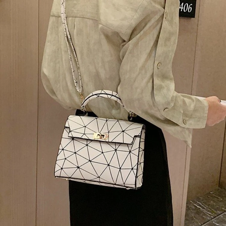 Snake Print Contrast Color Crossbody Shoulder Bag. Carry your essentials in style and comfort with this fashionable and 