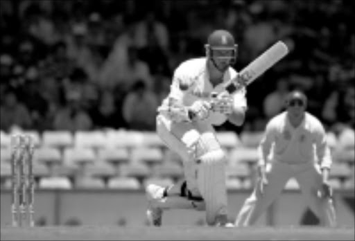 FOCUSED: South Africa's Graeme Smith in action during the first innings against Australia on day two of the first Test. 18/12/08. © Unknown.