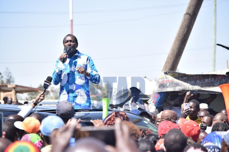 Wiper Party Leader Kalonzo Musyoka addresses residents of Mukuru during a courtesy visit to distribute foodstuff to victims of the demolitions at Sisal Zone in Mukuru Kwa Njenga, Nairobi on January 13, 2022.