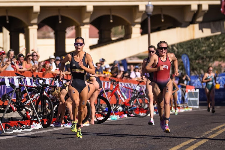 Amber Schlebusch, left, on her way to victory at the NCAA Championships in Tempe Town Lake, Arizona. Picture: ARIZONA STATE UNIVERSITY