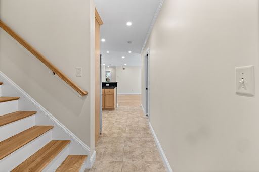 Stairs, hallway, kitchen in this luxury house for rent in Needham ($5,200)