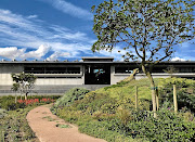 A view of the stark, modern Norval Foundation museum from the sculpture garden.