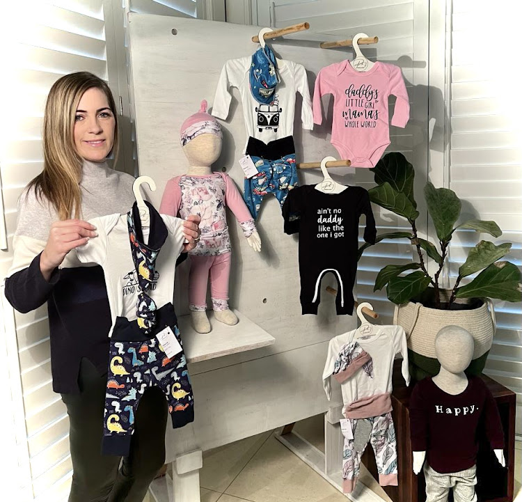 Pikkie Kids owner Ashley Soule Van Niekerk with some of her company's unique and delightful baby, toddler and children's clothing