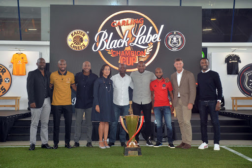 Sponsers, Kaizer Motaung Jnr,Benni McCarthy, Orlando Pirates head coach Kjell Jonevret and his counterpart Steve Komphela together with club captain Ramahlwe Mphahlele and Oupa Manyisa during the Carling Black Label Champion Cup launch at Park Station on May 02, 2017 in Johannesburg, South Africa.