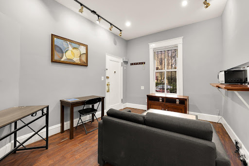 Living room with sofa and desk - Prestige house for sale in Washington, 11 bedrooms