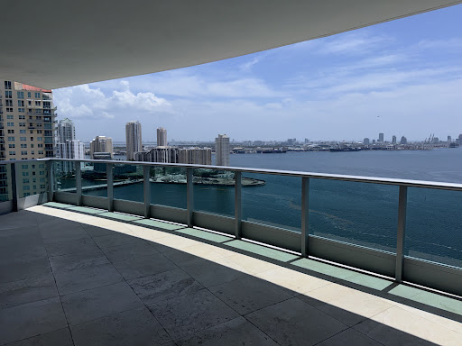 Balcony view of city and sea in this luxury property for rent in Miami ($12,000)