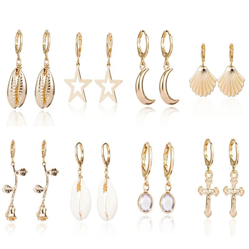 Mini pendientes de estrella rosa con concha, perfectos para realzar tu estilo diario. Diseño delicado y elegante, ideales para cualquier ocasión.