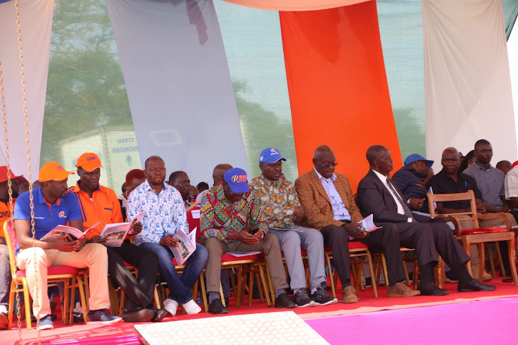 ODM leader Raila Odinga accompanied by several leaders at the burial of mama Tabitha Nabwera in Kiminini on May 28, 2022.