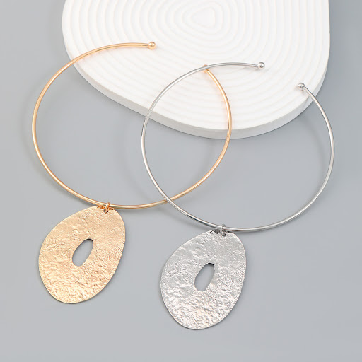 Title 5, Irregular Geometric Ring Metal Pendant. A uniqu...