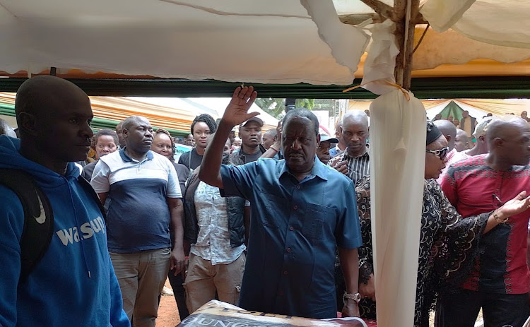 Raila Odinga pays his last respect to victims of alleged police brutality in Bondo