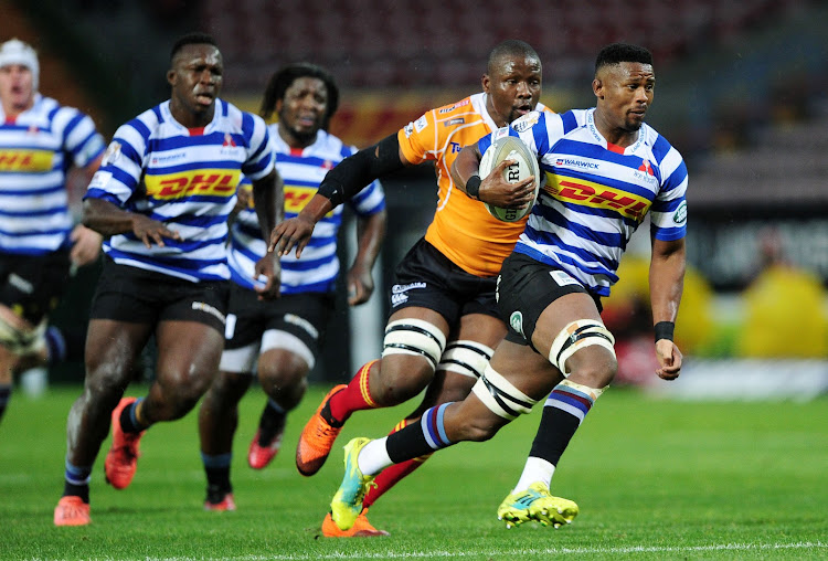 Sikhumbuzo Notshe of Western Province goes past Free State Cheetahs captain Oupa Mohoje during the Currie Cup game at the Newlands Rugby Stadium, Cape Town on August 25 2018.