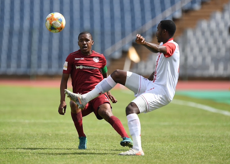 Lebohang Mokoena of Swallows FC in action with Katlego Mkhabela of Free State Stars during the GladAfrica Championship match between Swallows FC and Free State Stars at Dobsonville Stadium on January 25, 2020 in Johannesburg, South Africa.