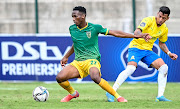 Simo Mbhele of Lamontville Golden Arrows brushes off Gaston Sirino of Mamelodi Sundowns in the DStv Premiership match at Sugar Ray Xulu Stadium on October 20 2021.
