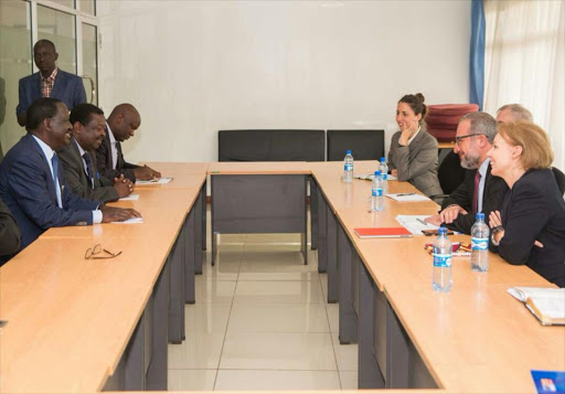 Foreign envoys led by Robert Godec of the United States during a meeting with NASA leader Raila Odinga in Nairobi, September 29, 2017. /EVANS OUMA