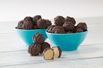 Chocolate Covered Peanut Butter Balls was pinched from <a href="http://www.peanutbutter.com/recipe.php?id=28" target="_blank">www.peanutbutter.com.</a>