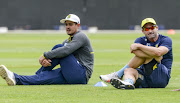 Quinton de Kock (L) and Dean Elgar (R) of South Africa of South Africa during the South African national men's cricket team training session and press conference at Bidvest Wanderers Stadium on January 23, 2018 in Johannesburg, South Africa. 