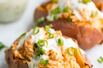 Healthy Creamy Buffalo Chicken Stuffed Sweet Potatoes with Ranch Dressing (Whole30, Paleo)