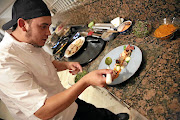 Executive chef Joshua Levack prepares a THC-infused meal for a pre-tasting ahead of his upcoming cannabis cuisine dinner. 