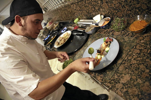 Executive chef Joshua Levack prepares a THC-infused meal for a pre-tasting ahead of his upcoming cannabis cuisine dinner.