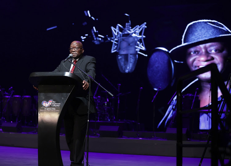 Former president Jacob Zuma speaks during a memorial service at the Playhouse in Durban. Zuma said the playwright was planning a production based on his life.