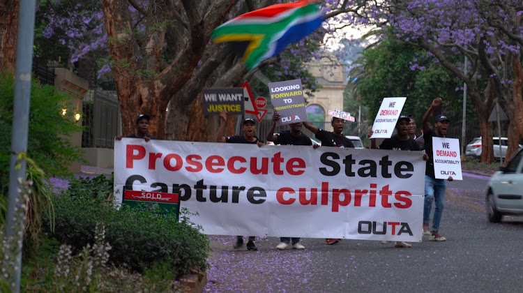 A picket in protest against alleged corruption by the Gupta brothers ended prematurely on Friday due to bad weather.