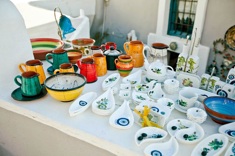 Pottery and earthenware at a shop along the main walkway in Oia on the Greek island of Santorini. 