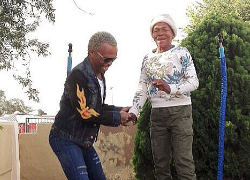 Somizi Mhlongo having fun with his mother, Mary Twala.