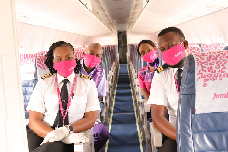 Jambojet Staff on board one of its aircrafts. The carrier has introduced a raft of measures to ensure its passengers and crew are protected against Covid-19 during travel./