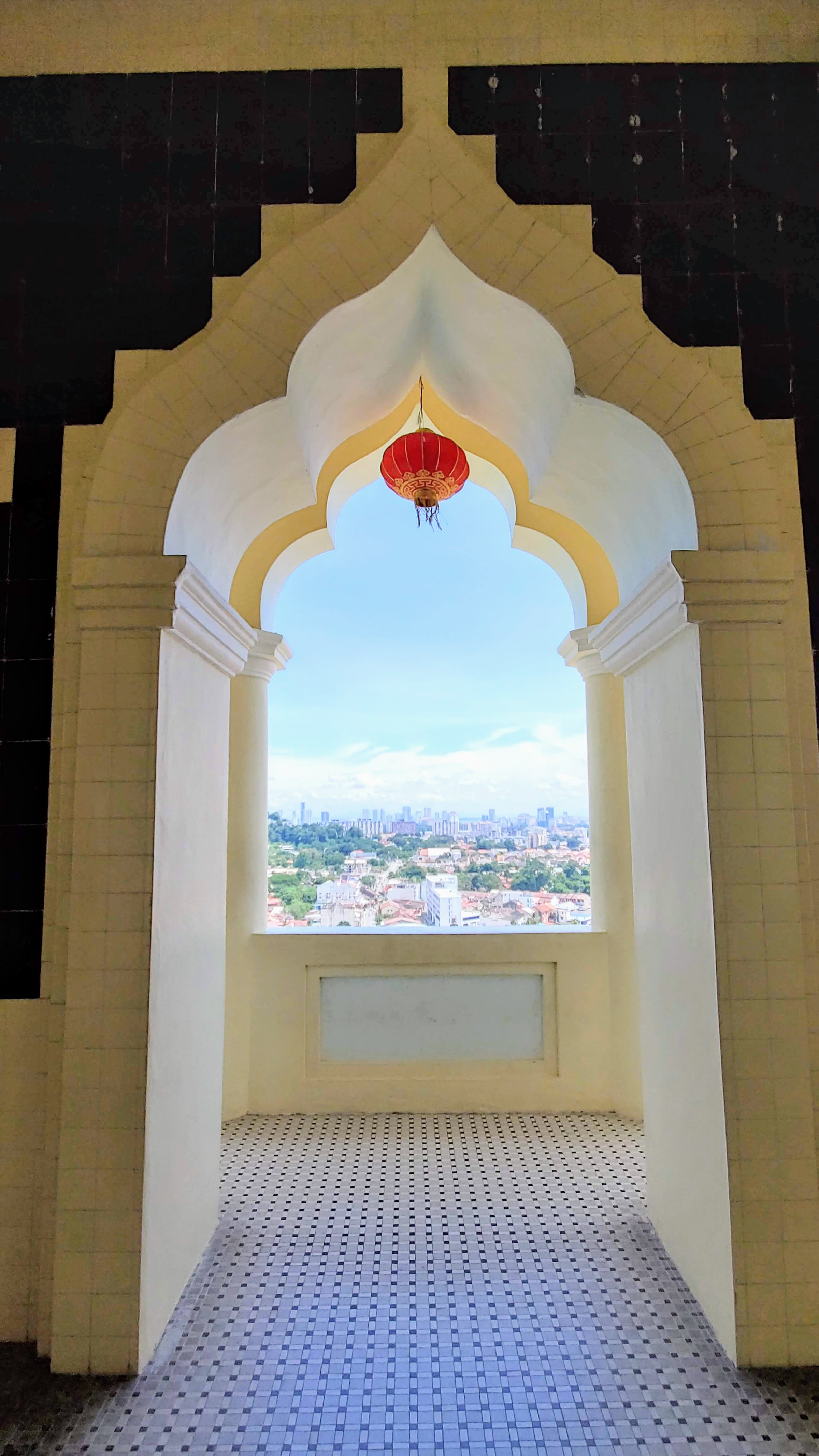 Visiting Kek Lok Si: What makes it unique is that among its millions of Buddhas it shows the blending of cultures that is so representative of Malaysia by including many stylistic representations of Buddha.