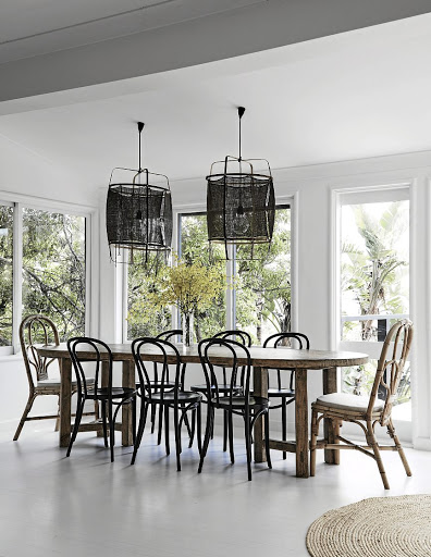 Homeowner Olivia likes to decorate with a mix of local finds and vintage pieces such as this dining table.