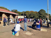 The queue for social relief of distress grants outside Redhill post office in Durban on Monday.