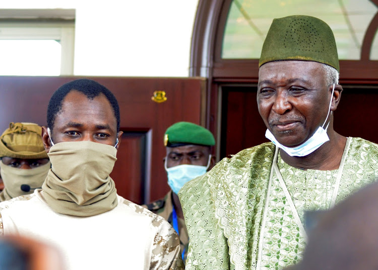 Malian president Assimi Goita, right.