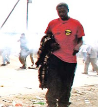 Photo: Hans, Mr Qwendenane Benjamin, SA resident seen here being shot dead by Ekhurleni police under the control of metro police chief Robert McBride in May 2008. Mr Hans had nothing to do with any rioting, he was enroute to his job when he was shot down together with the Rapport photographer who took this picture...