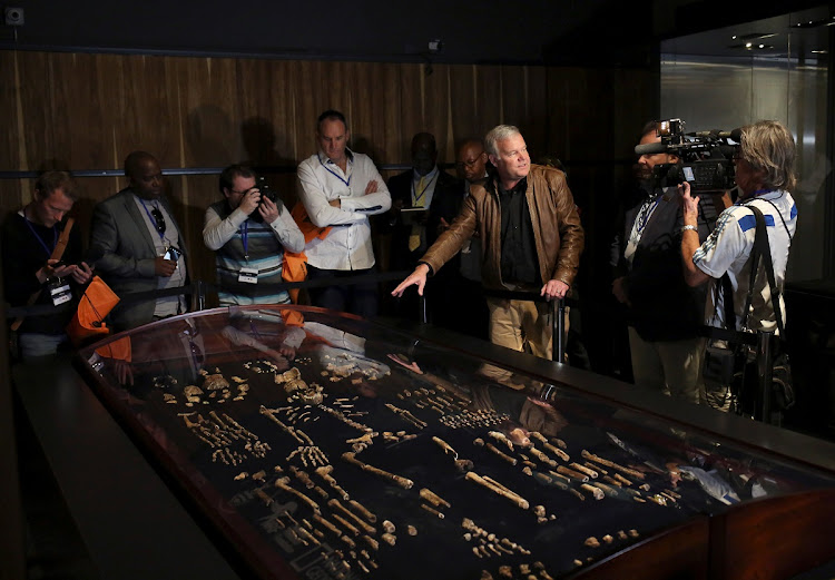 Prof Lee Berger gestures during an exhibit of the largest collection of fossils of close human relatives at the Cradle of Humankind in 2017.