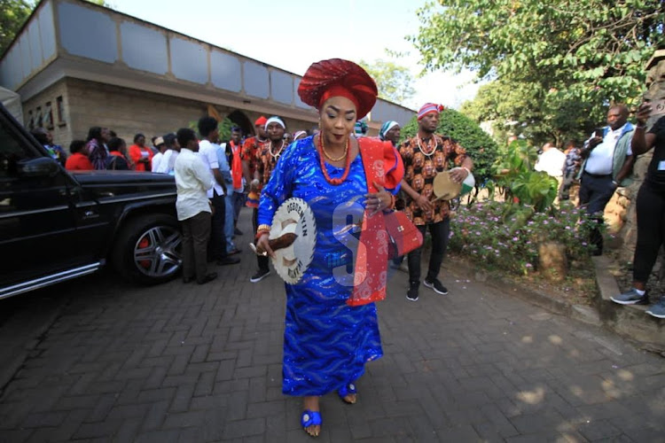 Former education CS George Magoha’s wife Barbara Odudu Magoha leads the procession outside Lee Funeral Home on February 8, 2023