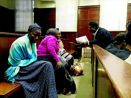 ritual killers: Fundiswa Faku, Lindelwa Jalubane, Nokubonga Jalubane and Minenhle Jalubane in court where they were expected to be sentenced but the matter was instead postponed to next year Photo: Phumlani Thabethe