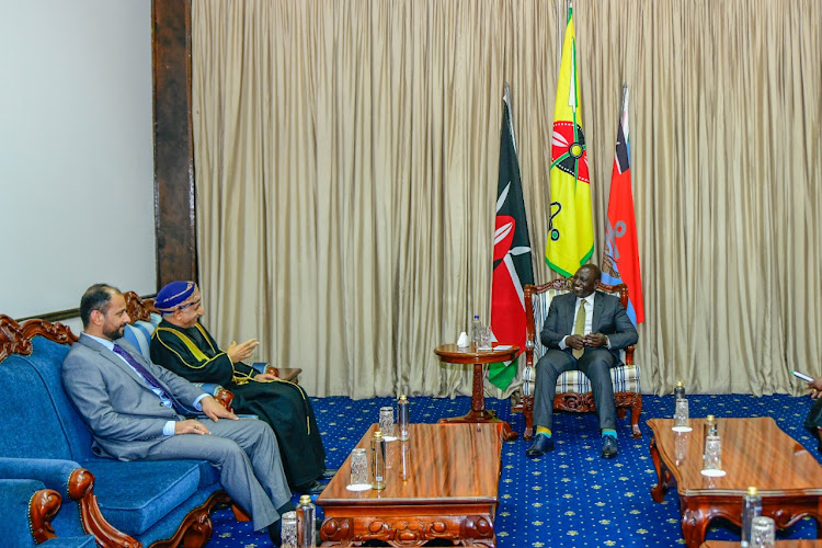 President William Ruto in a meeting with the outgoing Oman Ambassador to Kenya Saleh Sulaiman Al-Harthi and another official on October 18,2022.