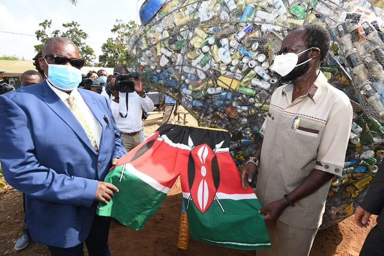 Kisumu Governor Anyang Nyong'o and his Homabay counterpart Cyprian Awiti during the launch