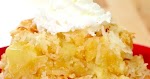 Piña Colada Cake was pinched from <a href="http://getinmybelly.com/pina-colada-cake/" target="_blank">getinmybelly.com.</a>